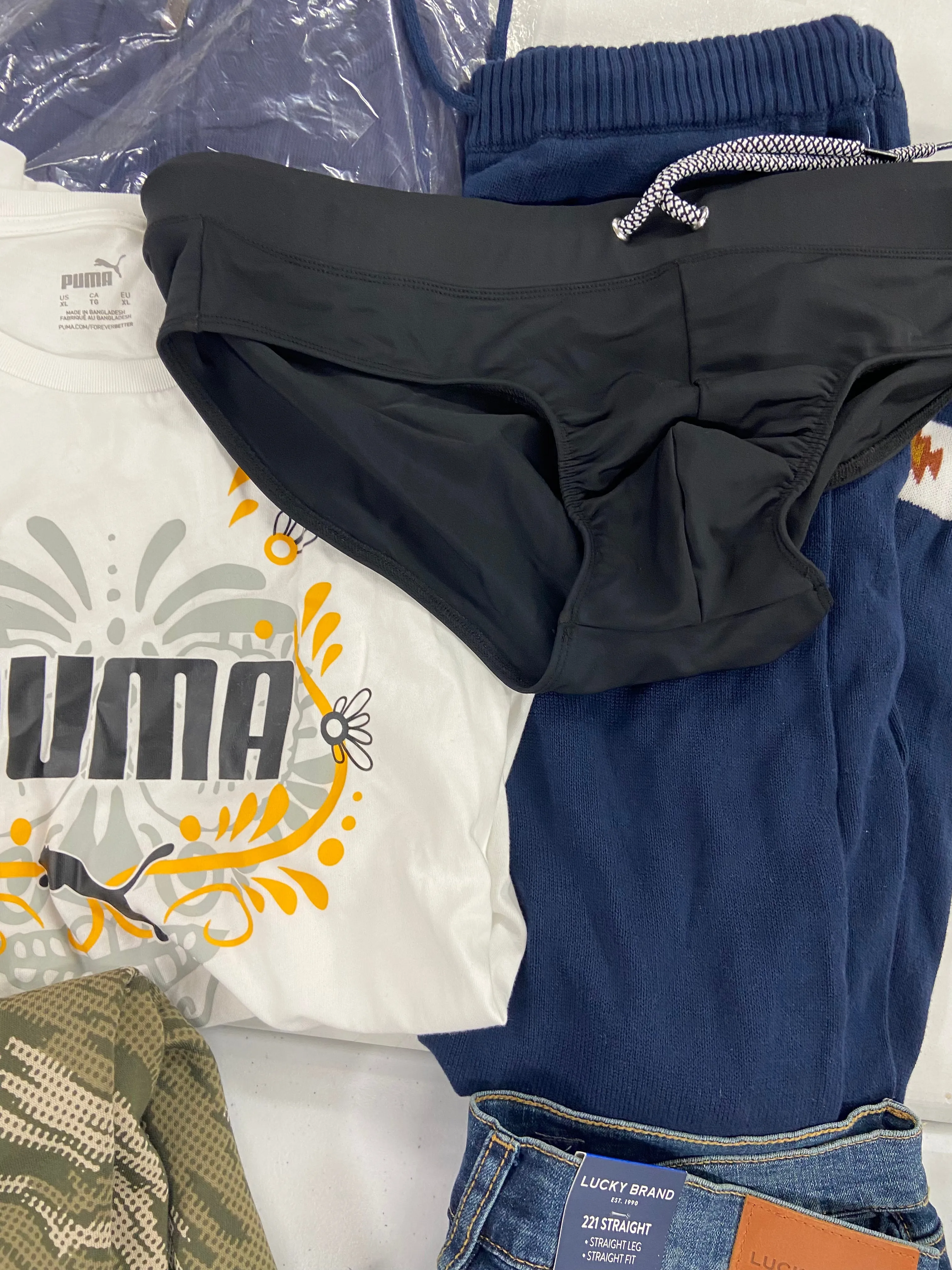 Men's Clothing Assorted Wholesale Lot, NAUTICA, LUCKY BRAND, PUMA, NICK GRAHAM, BASS HYBRID, INC and more, 14 items, Shelf Pulls, MSRP $1,131