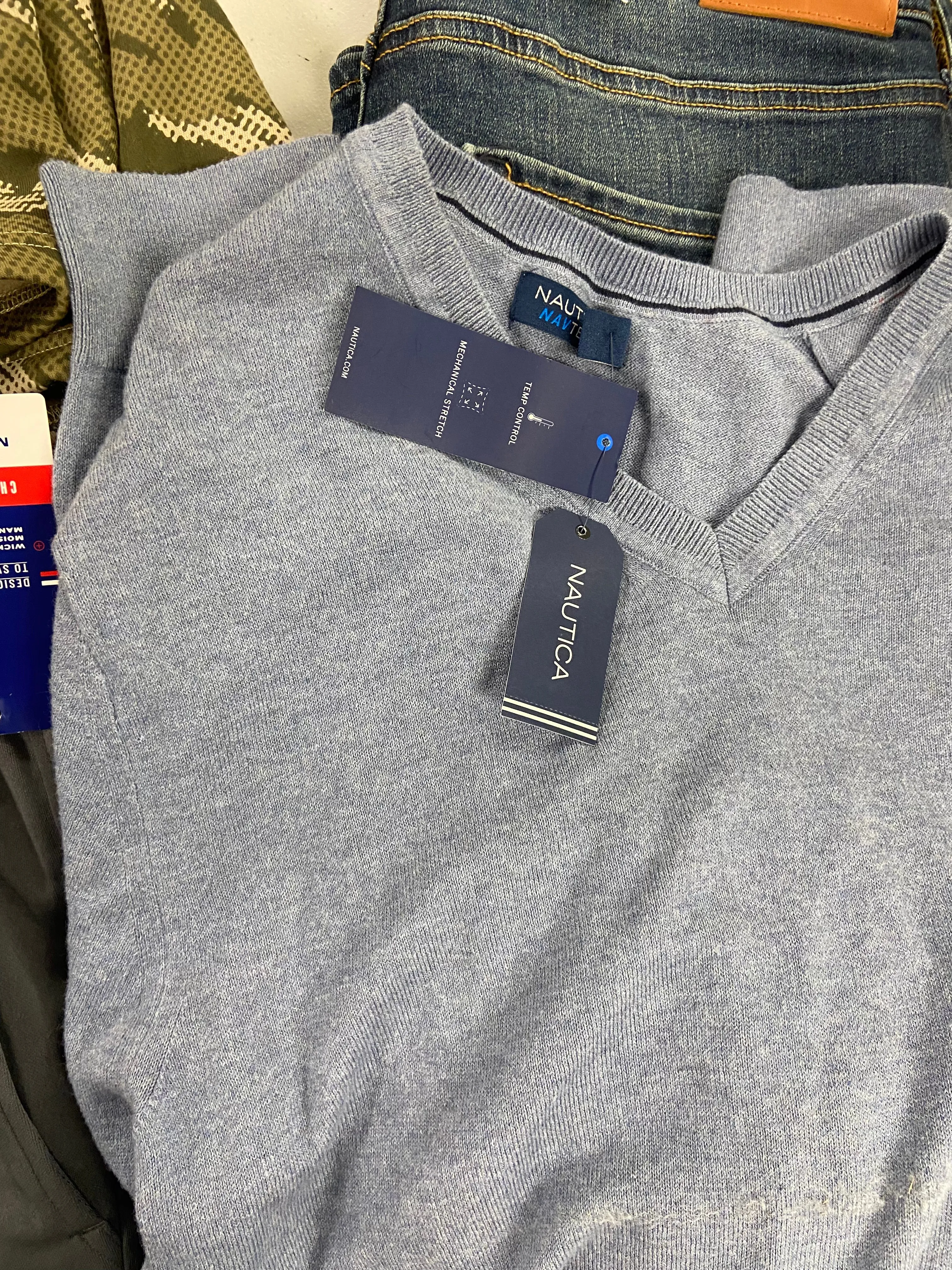 Men's Clothing Assorted Wholesale Lot, NAUTICA, LUCKY BRAND, PUMA, NICK GRAHAM, BASS HYBRID, INC and more, 14 items, Shelf Pulls, MSRP $1,131